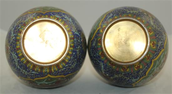 A pair of Chinese cloisonne enamel dragon bottle vases, early 20th century, 25.5cm